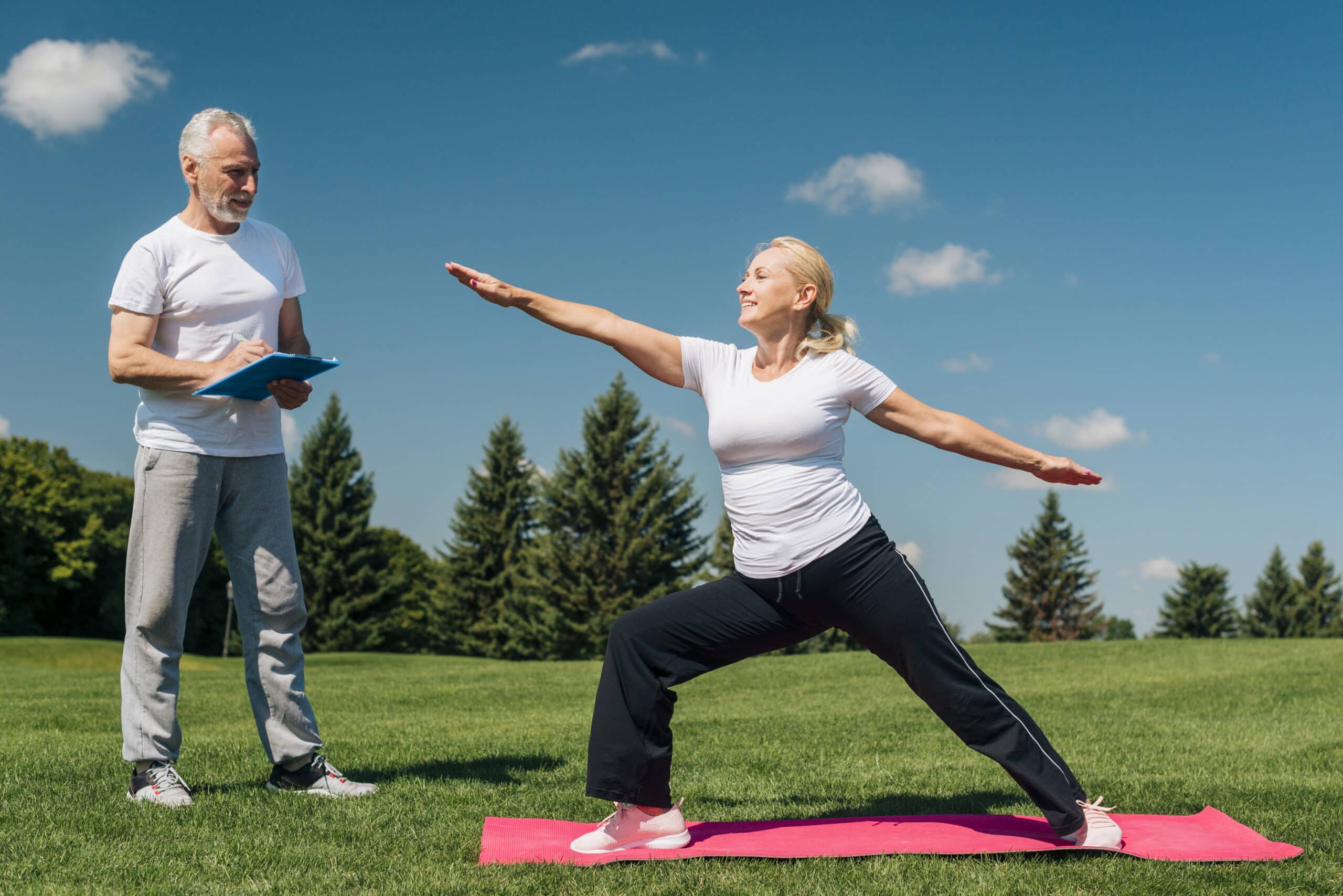 women learning yoga